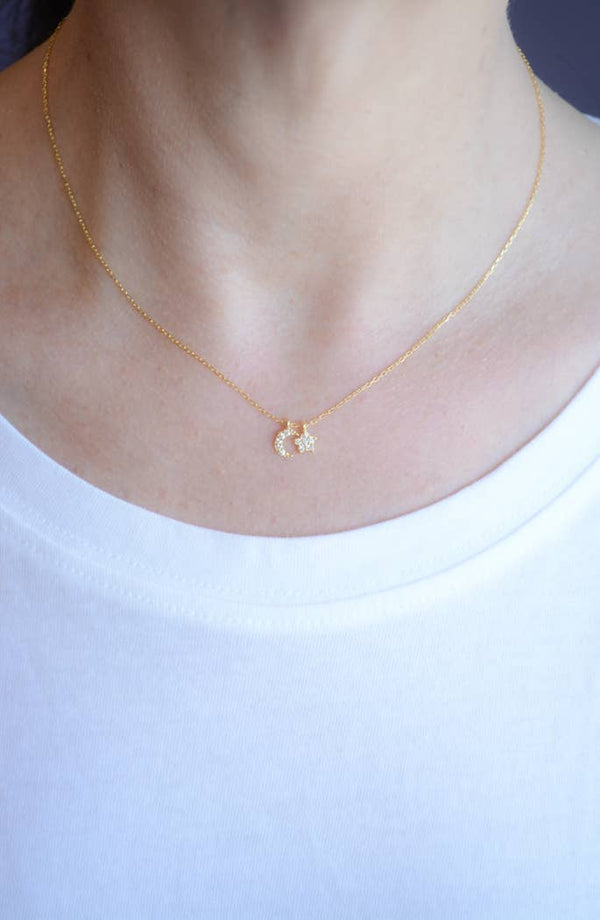 Gold necklace with cz moon and star pendant